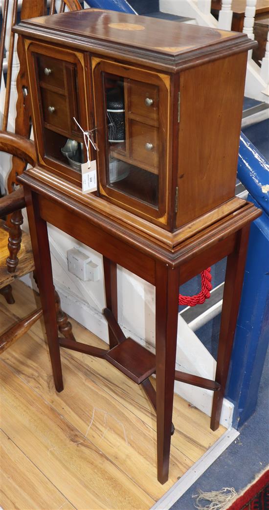 An Edwardian inlaid mahogany smokers cabinet L.52cm